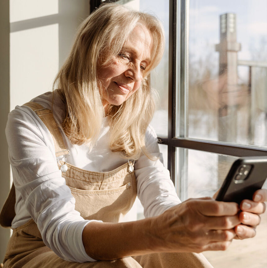 Woman uses her phone